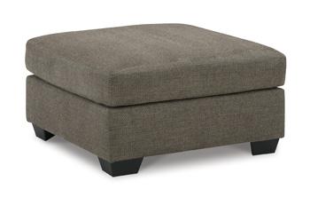 Ashley Furniture Mahoney living room set with sofa and armchair in a modern design, featuring neutral upholstery and wooden accents.