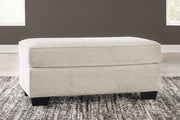 Ashley Furniture Heartcort living room set featuring a sofa and loveseat with plush cushions and modern design.