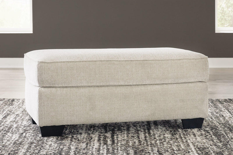 Ashley Furniture Heartcort living room set featuring a sofa and loveseat with plush cushions and modern design.