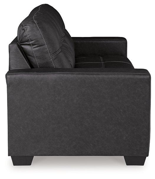 Ashley Furniture Barlin Mills sleeper sofa with plush fabric and convertible design, shown in a modern living room setting.