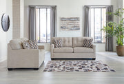 Ashley Furniture Mahoney living room set featuring a sofa and loveseat with plush cushions and modern design.