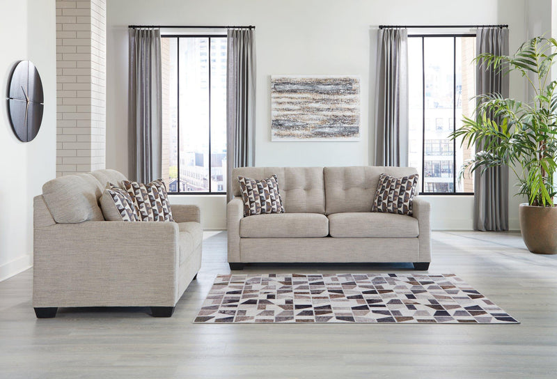 Ashley Furniture Mahoney living room set featuring a sofa and loveseat with plush cushions and modern design.