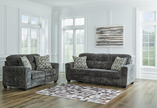 Ashley Furniture Lonoke living room set featuring a sofa and matching chairs in a modern, stylish design.