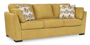 Ashley Furniture Keerwick living room set with sofa and loveseat in a cozy, modern design, featuring neutral fabric upholstery.
