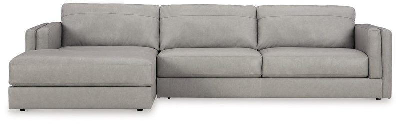 Ashley Furniture Amiata sectional with chaise, featuring plush fabric, modern design, and comfortable seating in a stylish living room setting.
