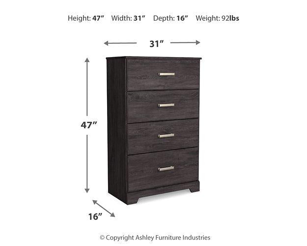 Ashley Furniture Belachime chest of drawers with six spacious wooden drawers and modern design in a home interior.