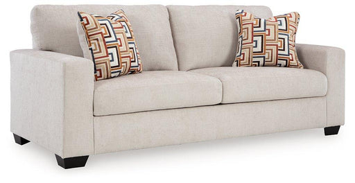 Ashley Furniture Aviemore Sofa Sleeper with plush cushions and a modern design, shown in a cozy living room setting.