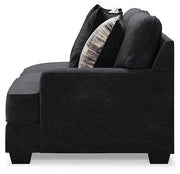 Ashley Furniture Lavernett living room set with plush sofa and coordinating armchair in a modern living space.
