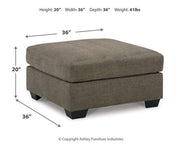Ashley Furniture Mahoney Living Room Set with sofa and armchair, featuring neutral upholstery and modern design.