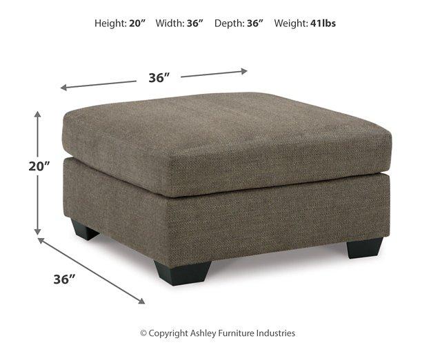 Ashley Furniture Mahoney Living Room Set with sofa and armchair, featuring neutral upholstery and modern design.