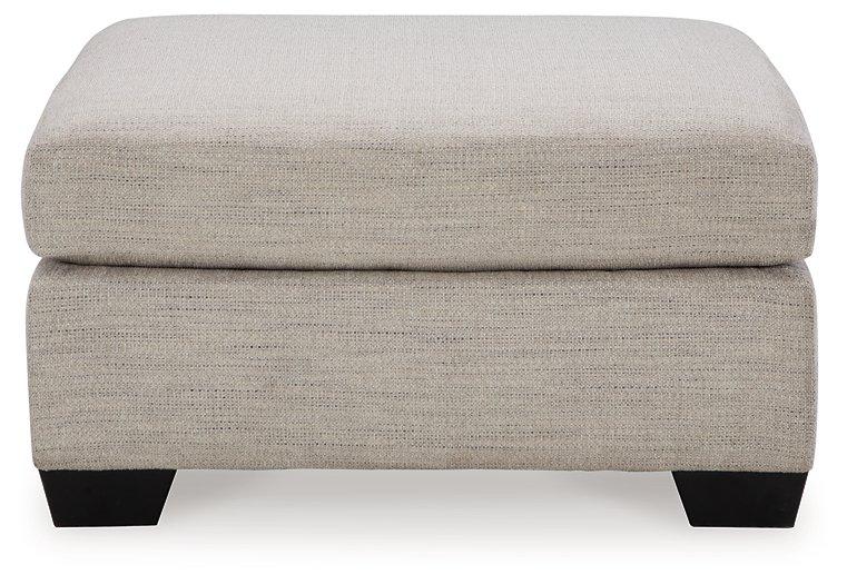 Ashley Furniture Mahoney Living Room Set with sofa and armchair in a modern living room setting.