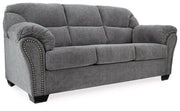 Ashley Furniture Allmaxx sofa with plush cushions and modern design, shown in a cozy living room setting.