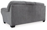 Ashley Furniture Allmaxx Sofa with plush cushions and modern design, shown in a living room setting.