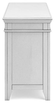 Ashley Furniture Kanwyn Credenza curio with glass doors and wooden finish, showcasing decorative items inside.