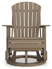Ashley Furniture Hyland Wave outdoor swivel glider chair with a cushioned seat and curved back for comfortable outdoor dining.