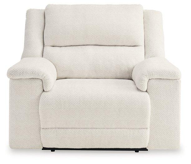 Ashley Furniture Keensburg oversized power recliner with plush upholstery and padded armrests, designed for comfort and relaxation.