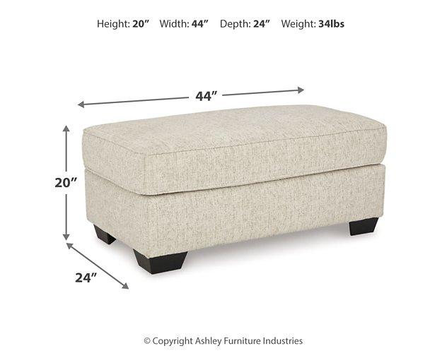 Ashley Furniture Heartcort living room set with plush sofa and matching armchair in a modern living space.
