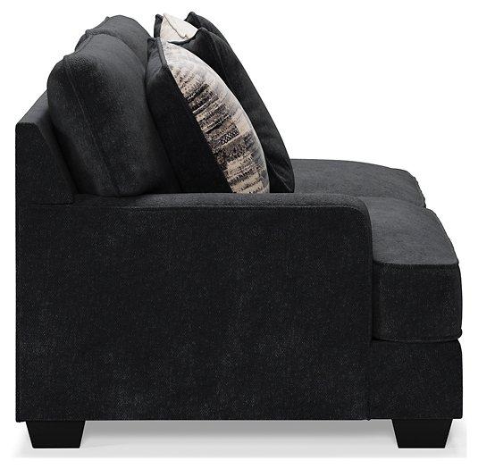 Ashley Furniture Lavernett living room set with sofa and armchair in a modern design, showcasing plush fabric and contemporary style.