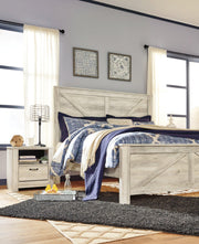 Ashley Furniture Bellaby Crossbuck Bed with dark wood finish, showcasing the rustic crossbuck design and sturdy frame.
