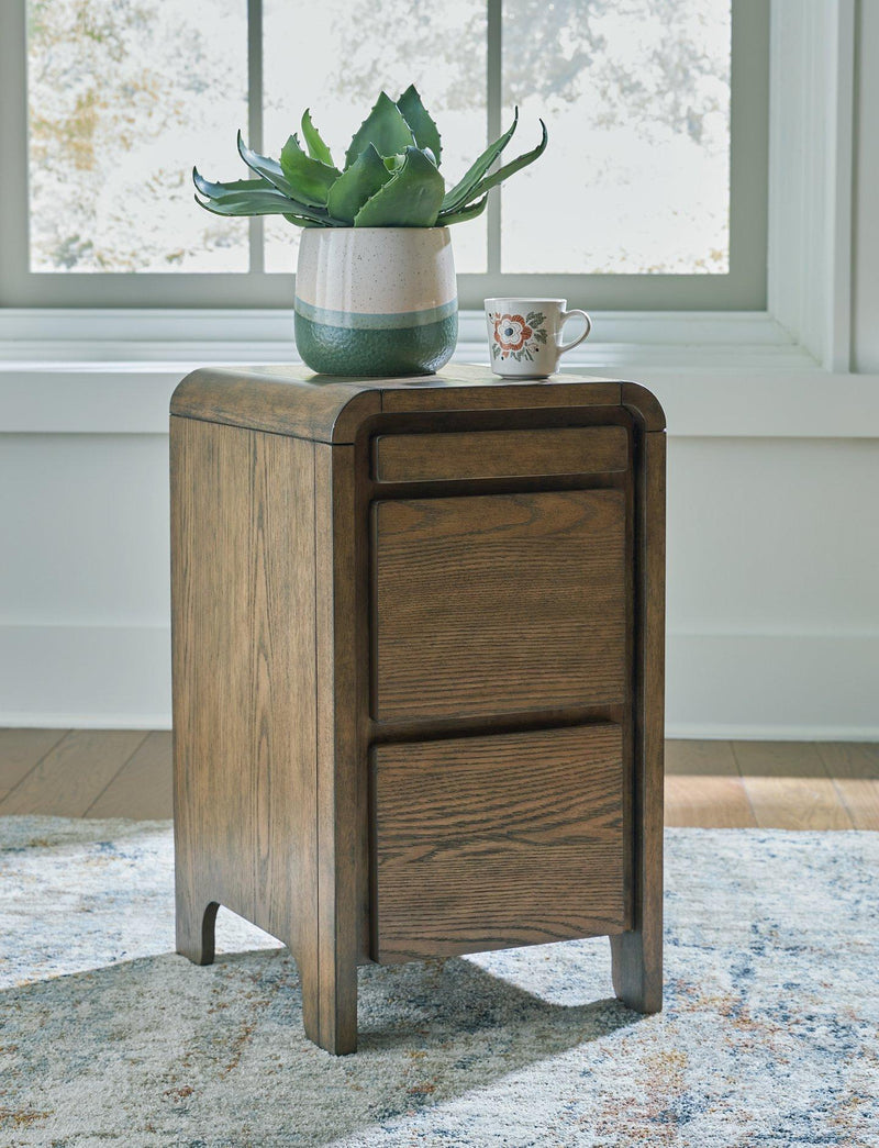 Ashley Furniture Jensworth accent table with a wooden top and metal legs, ideal for living room or bedroom decor.