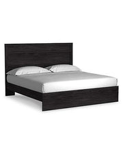 Ashley Furniture Belachime bedroom set with matching bed frame, dresser, and nightstands in a modern bedroom setting.