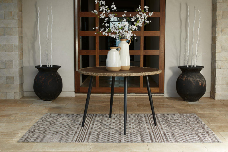 Amaris outdoor dining set by Ashley Furniture featuring a table and chairs for outdoor patio dining.