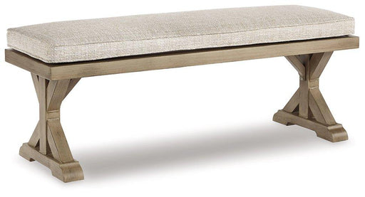 Outdoor dining bench by Ashley Furniture with a cushioned seat, suitable for patio or garden seating.