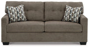 Ashley Furniture Mahoney living room set with sofa and armchair, featuring neutral upholstery and modern design.