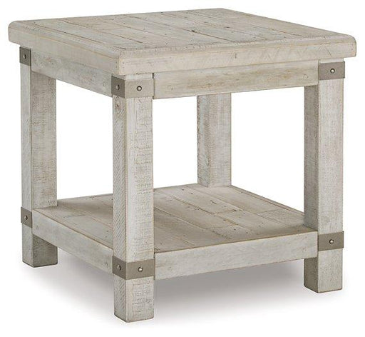 Ashley Furniture Carynhurst End Table with wood finish and classic design, featuring a spacious top and elegant storage drawer.