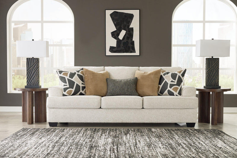 Ashley Furniture Heartcort living room set featuring a sofa and armchair with neutral upholstery and modern design.