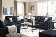 Ashley Furniture Altari living room set featuring a sofa, loveseat, and armchair with neutral upholstery and wooden accents