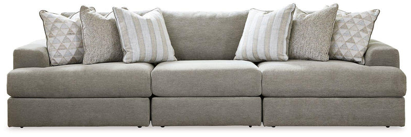 Ashley Furniture Avaliyah sectional sofa with plush cushions and modern design, shown in a living room setting.