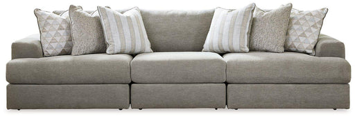 Ashley Furniture Avaliyah sectional sofa with plush cushions and modern design, shown in a living room setting.