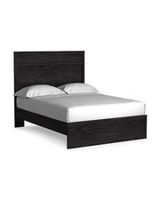 Ashley Furniture Belachime Bedroom Set featuring a bed frame, matching nightstands, and dresser in a modern bedroom design.
