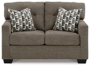 Ashley Furniture Mahoney Living Room Set with sofa and armchair, featuring plush cushions and contemporary design.