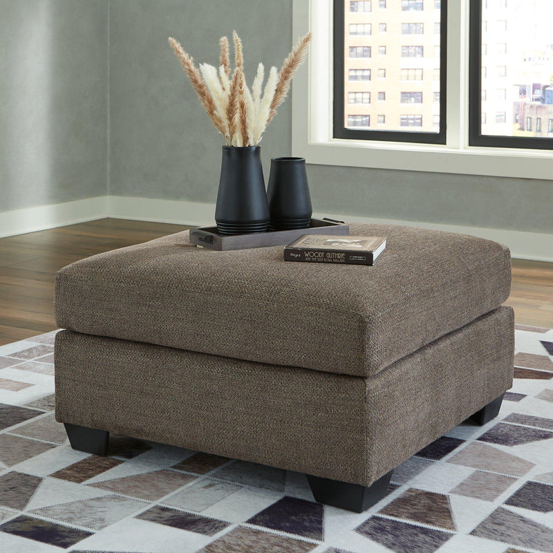 Ashley Furniture Mahoney living room set with sofa and loveseat, featuring plush upholstery and modern design.