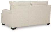 Ashley Furniture Heartcort Living Room Set with sofa and armchair featuring neutral upholstery and modern design.