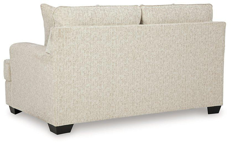 Ashley Furniture Heartcort Living Room Set with sofa and armchair featuring neutral upholstery and modern design.