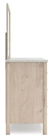 Ashley Furniture Cadmori dresser and mirror set showing a modern wooden dresser with a matching mirror.