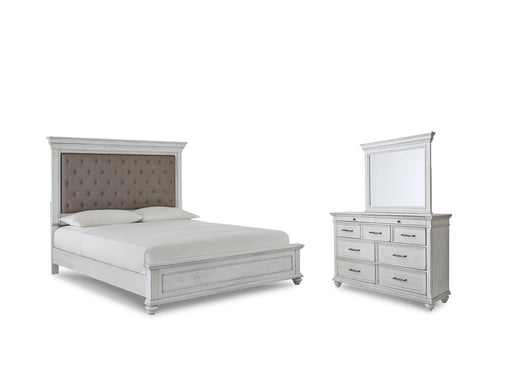 Ashley Furniture Kanwyn bedroom set with a modern bed frame, matching nightstands, and a spacious dresser in a stylish bedroom.