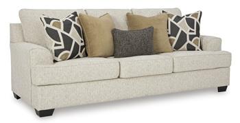 Ashley Furniture Heartcort living room set with a sofa and armchair featuring neutral upholstery and modern design.
