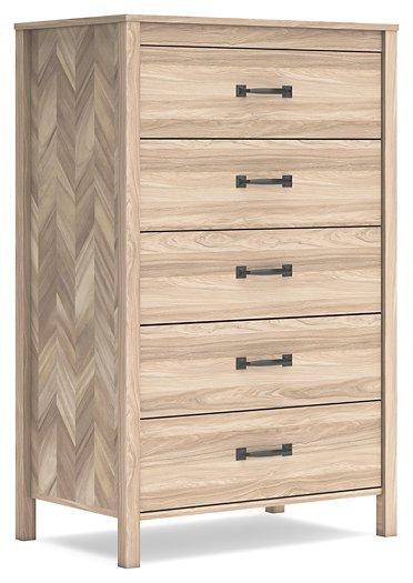 Ashley Furniture Battelle chest of drawers showing a sleek wooden dresser with multiple drawers and modern design.