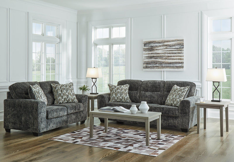 Ashley Furniture Lonoke living room set with sofa and loveseat, featuring plush cushions and neutral upholstery.