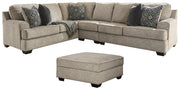 Ashley Bovarian Living Room Set featuring a sofa, loveseat, and armchair with plush upholstery and modern design.