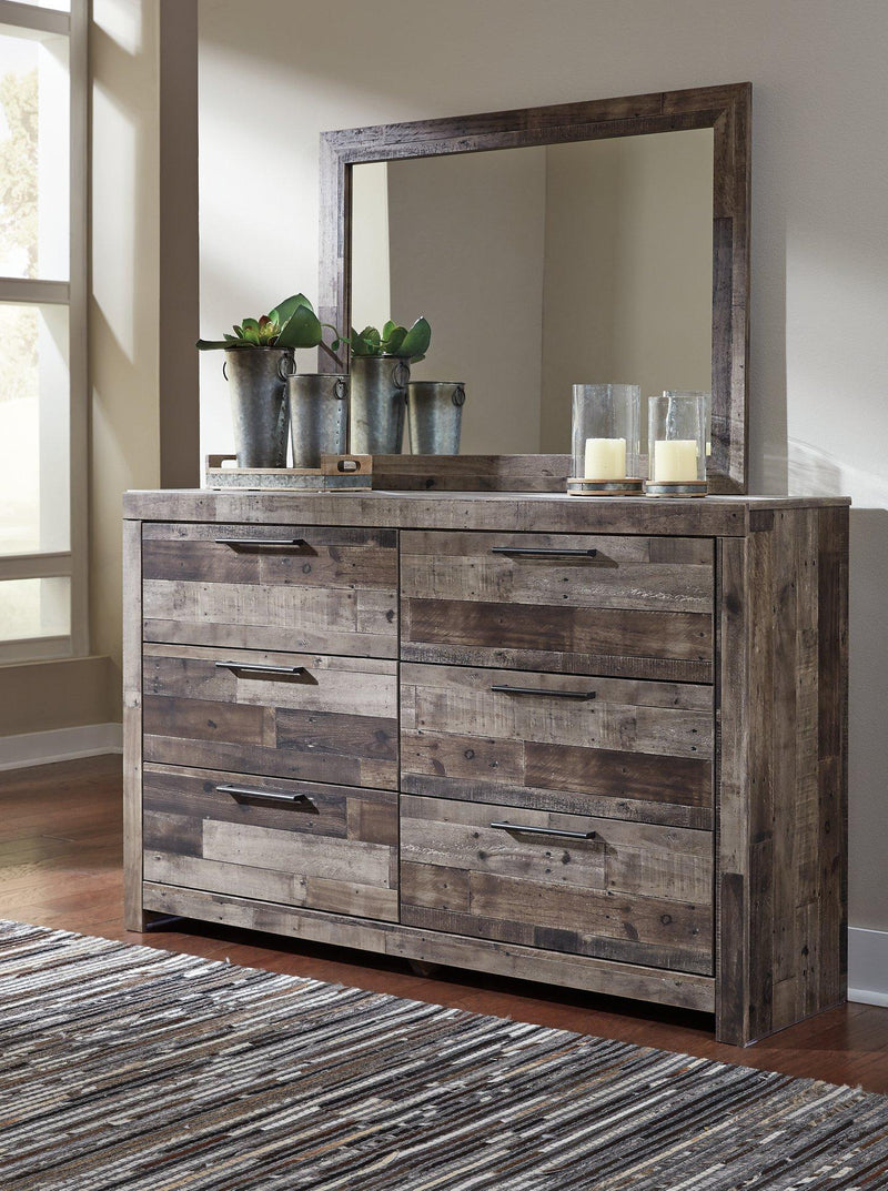 Derekson dresser with matching mirror from Ashley Furniture, featuring a modern wooden design with sleek handles.