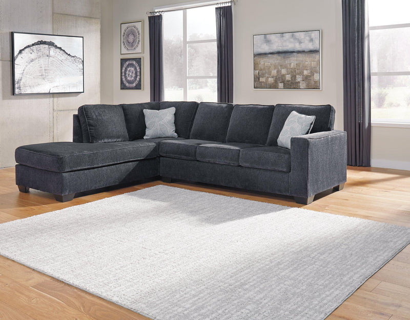 Ashley Furniture Altari living room set with sofa, loveseat, and armchair featuring neutral upholstery and modern design.