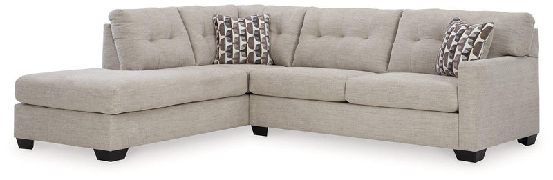 Ashley Mahoney Living Room Set with sofa and armchair in a modern, neutral fabric, featuring plush cushions and wooden legs.