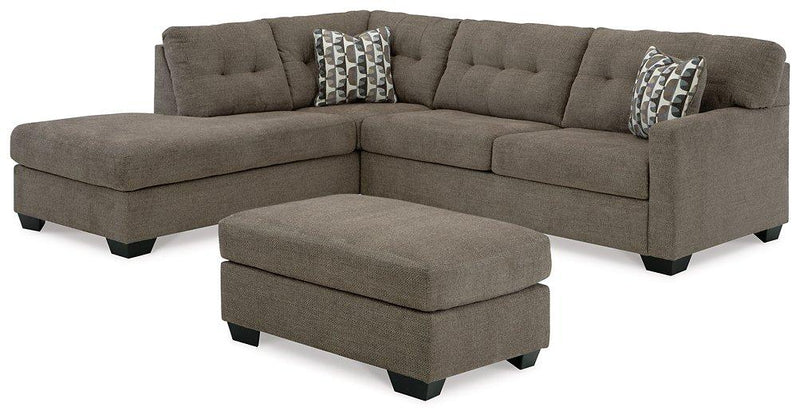 Ashley Furniture Mahoney living room set with a sectional sofa and matching coffee table, modern design with plush cushions.