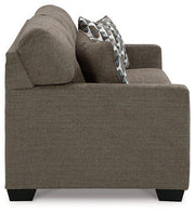 Ashley Furniture Mahoney living room set with sofa, loveseat, and armchair in a modern design, perfect for stylish home decor.