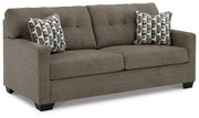 Ashley Furniture Mahoney living room set with sofa, loveseat, and armchair in a modern design, displayed in a cozy living space.